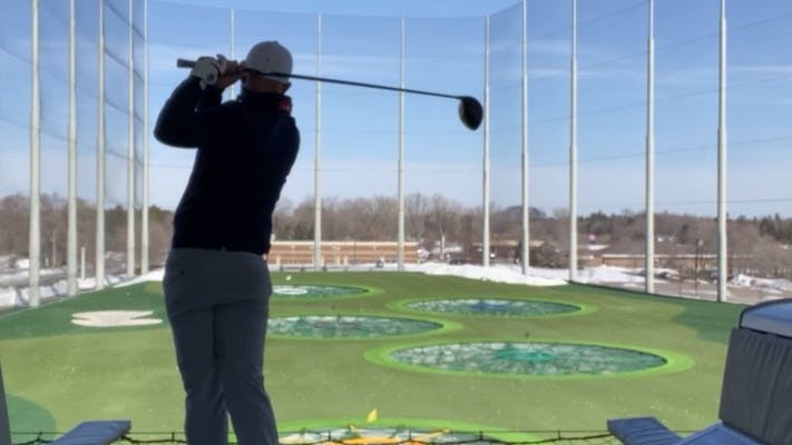 Golf Expert Kyle Emery hitting a ball with the Mizuno ST-Z 230 Driver