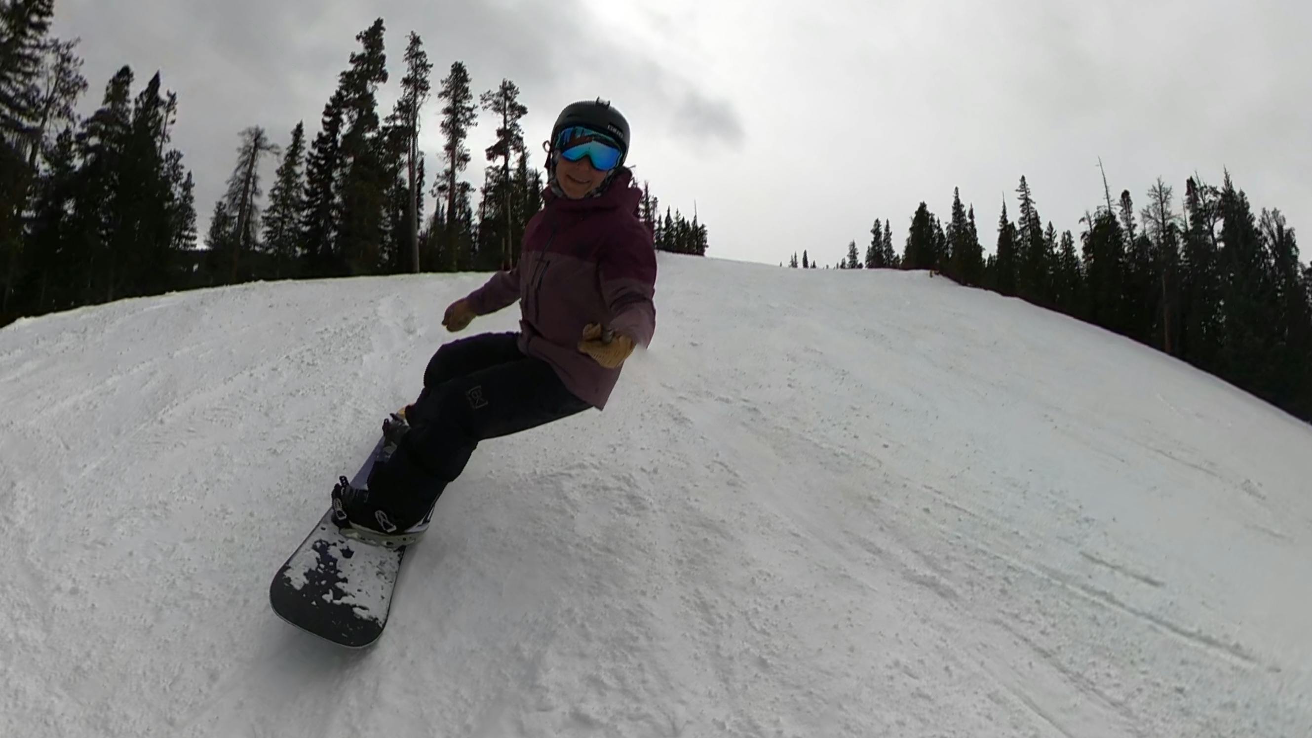 A snowboarder on the Burton Feelgood Flying V Snowboard . 
