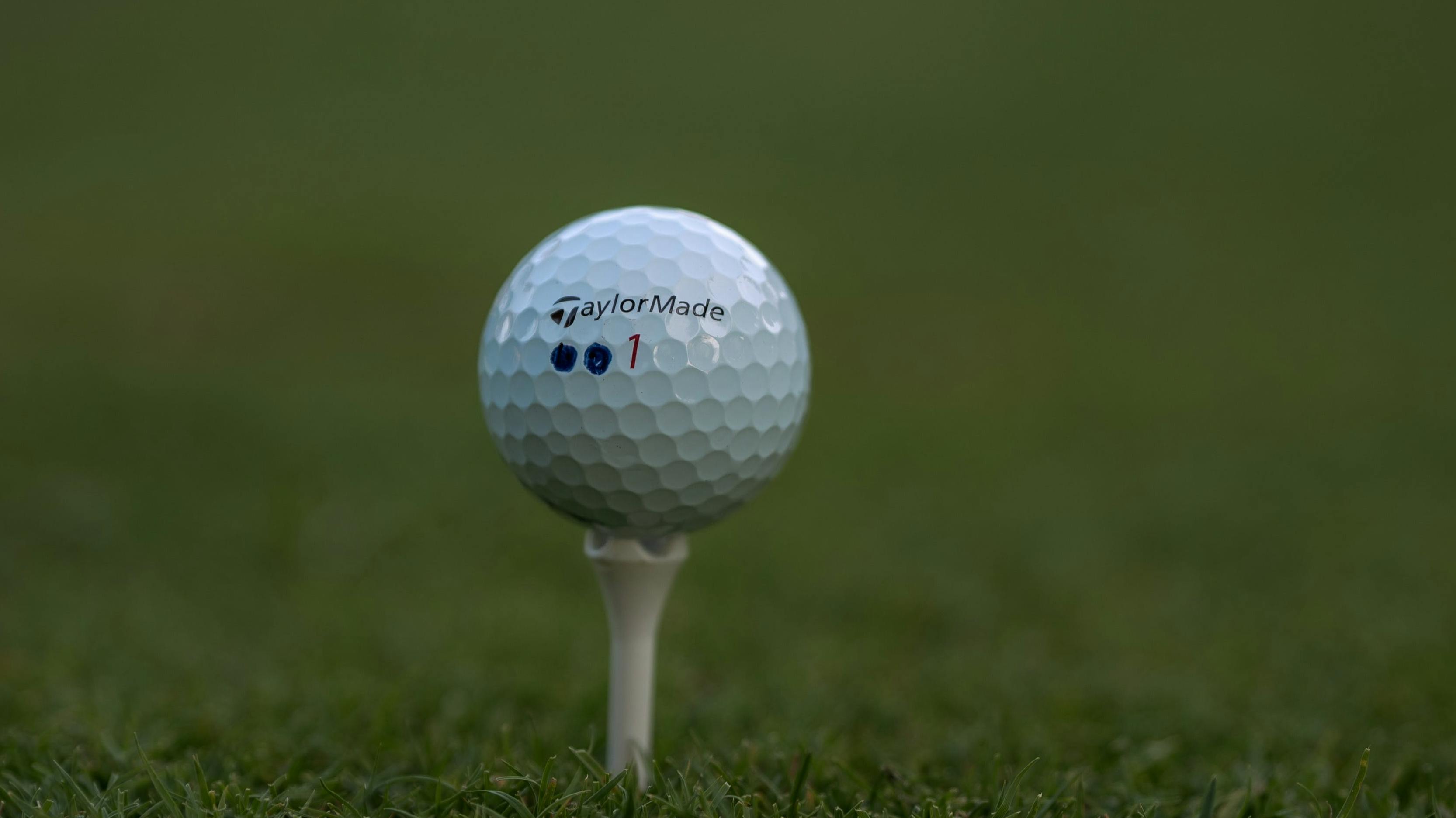 Taylormade Golf Ball on a tee.