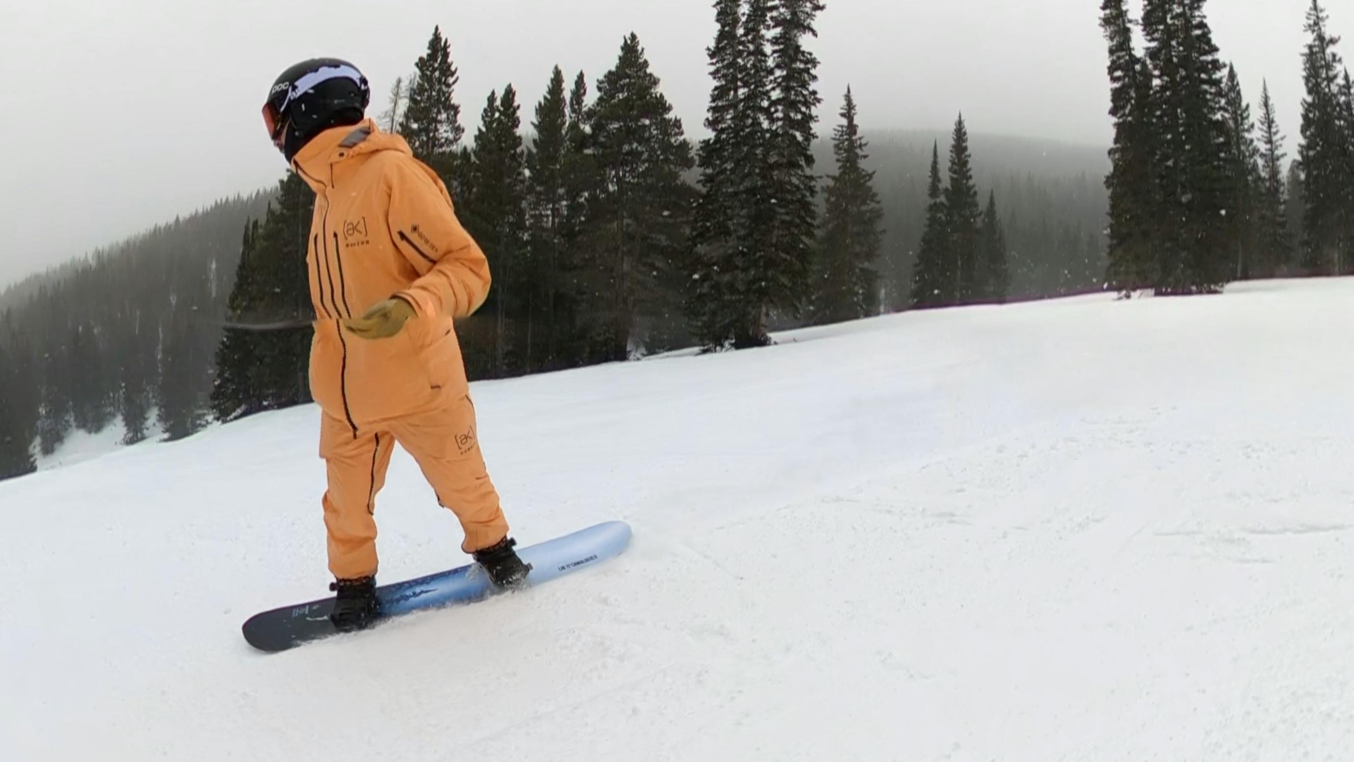 A snowboarder on the  Lib Tech Cold Brew Snowboard. 