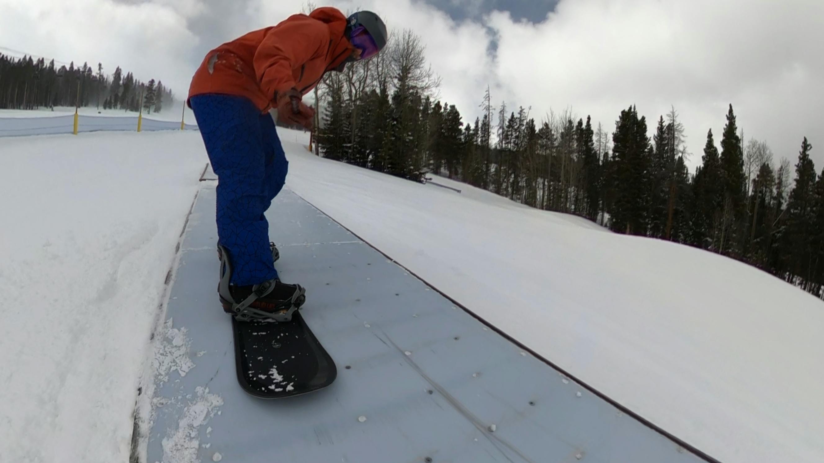 A snowboarder on the Arbor Formula Camber Snowboard. 