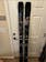 A pair of Moment Deathwish 104 skis mounted with Look Pivot bindings 