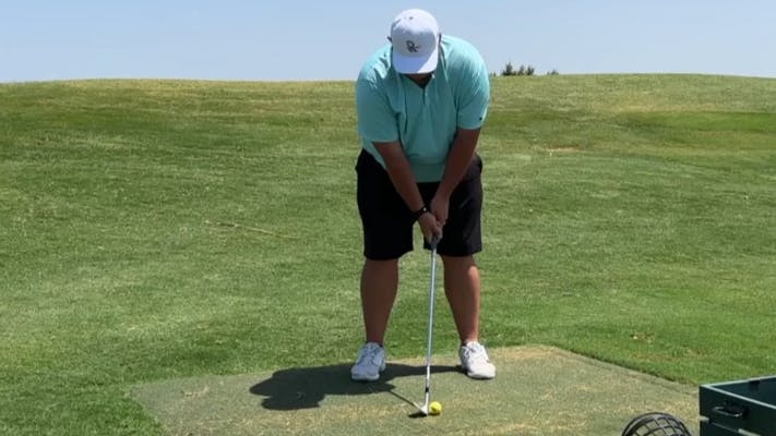 A golfer using the  TaylorMade Hi-Toe 3 Wedge. 