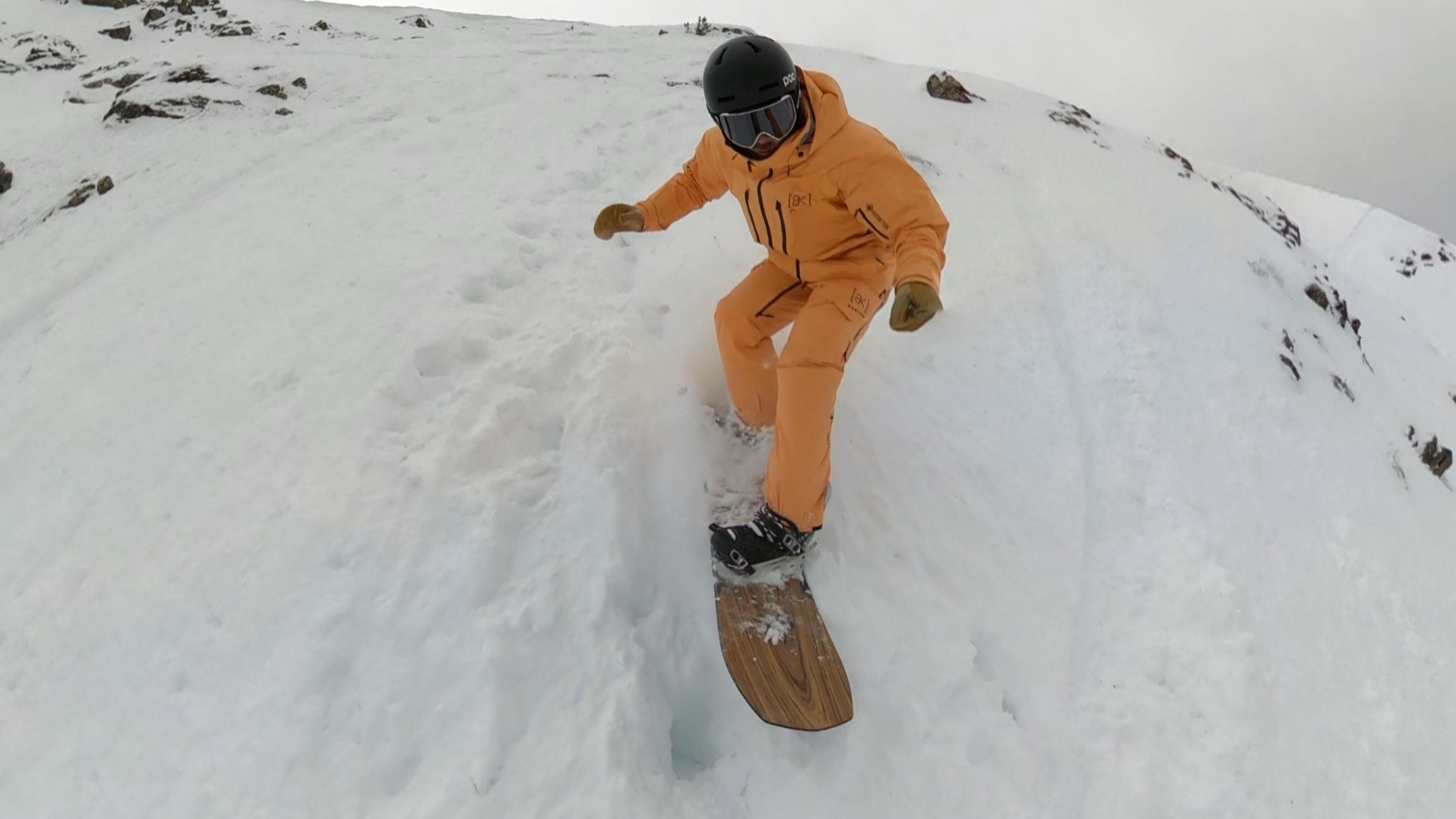 A snowboarder on the Jones Flagship Snowboard.